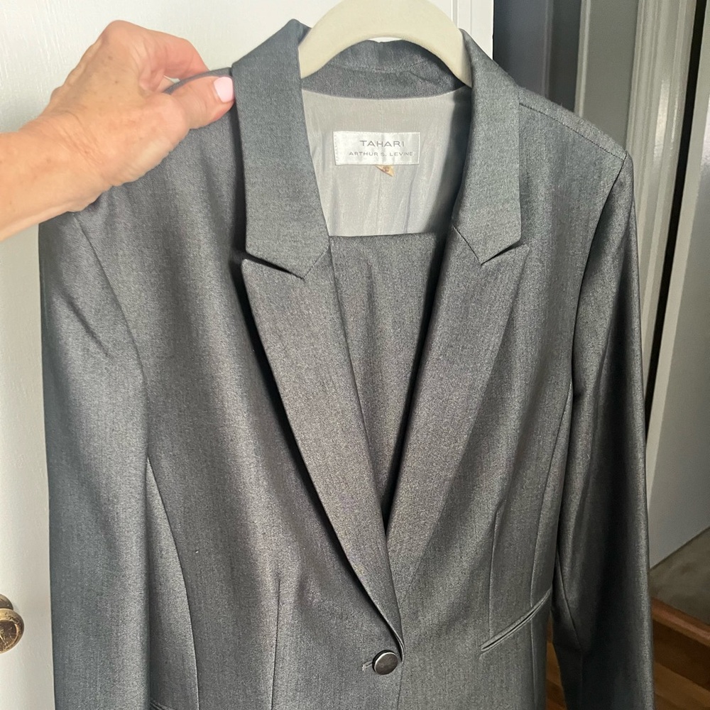 grey woman’s pant suit steel grey